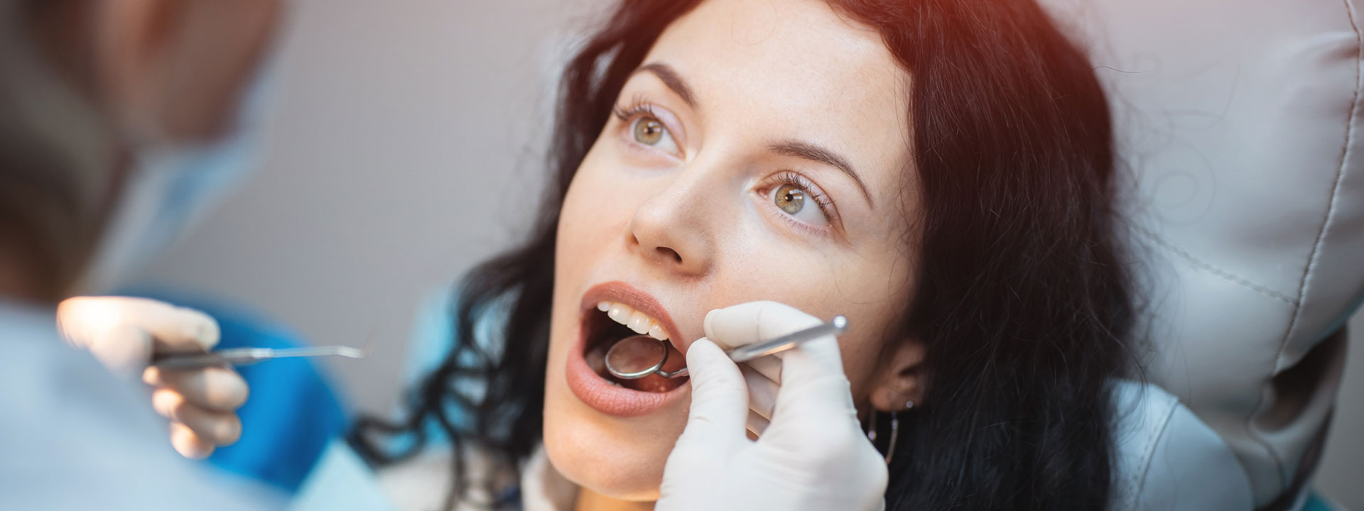 A woman is having dental check-up