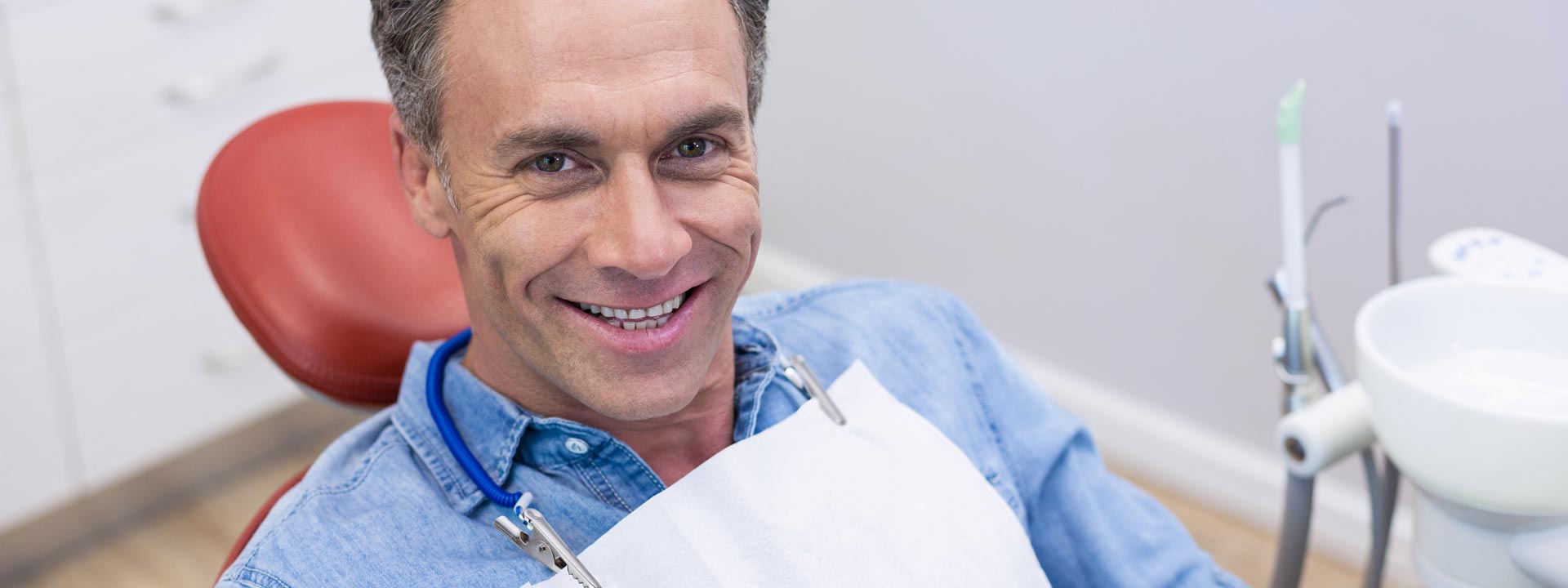 Man ready for dental implant treatment